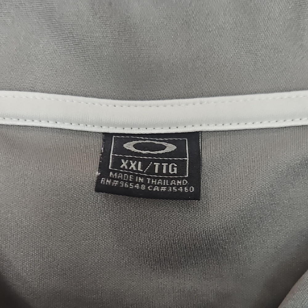 3/$35 Oakley Gray Polo Shirt with Striped Design - Picture 5 of 5
